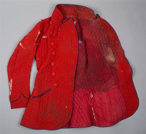 Cultural and Historical Significance of Garments Stained with Vital Fluids in Dream Imagery