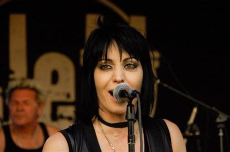 From Teenage Rebellion to Solo Stardom: Joan Jett's Journey in the Music Industry